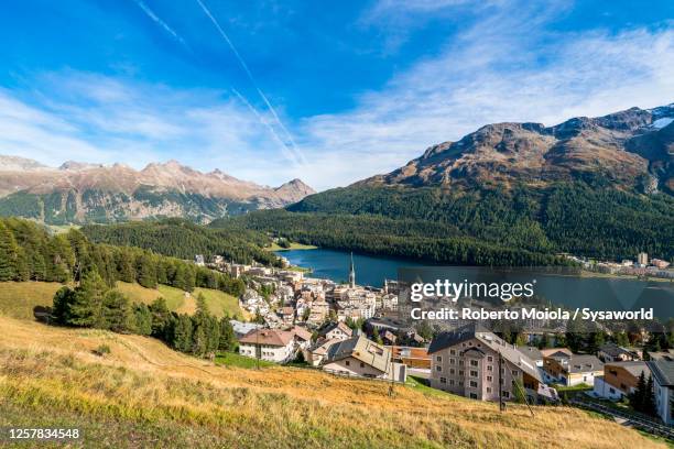 st. moritz village and lake in summer, switzerland - st moritz stock pictures, royalty-free photos & images