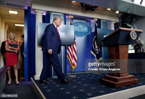 President Donald Trump arrives at a news conference about his administration's response to the ongoing coronavirus pandemic at the White House on...