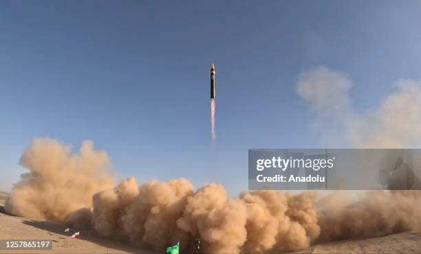 Iran's medium-range ballistic missile called Hayber is seen after the launch during the promotional program organized with the participation of...