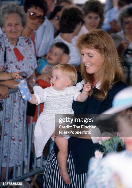 Princess Beatrice with her mother Sarah The Duchess of York embark the Royal Yacht Britannia preparing to cruise to Scotland from Portsmouth on 4th...