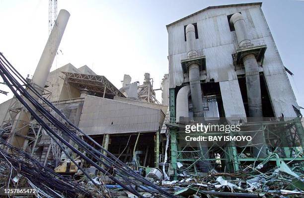 Scene of the completely damaged French-run cement factory in Lhok Nga district in Aceh Jaya, 06 January 2005. Over 146,000 people lost their lives...