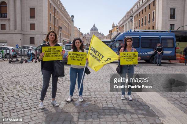 Amnesty International Italia activists in solidarity with "Ultima Generazione" activists on the occasion of the second hearing of the Vatican trial...