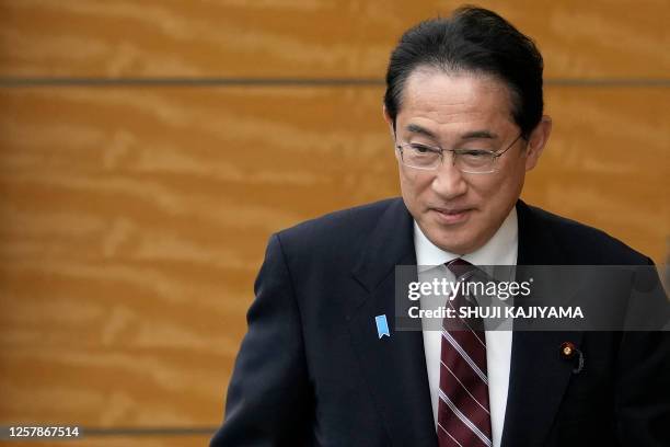 Japanese Prime Minister Fumio Kishida arrives for a bilateral meeting with Laos' President Thongloun Sisoulith at the prime minister's office in...