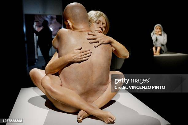 View shows "Embrace" by US artist Marc Sijan during the exhibition "LOOKING ALIVE! Hyperrealist Sculptures by the Greatest Contemporary Artists" on...