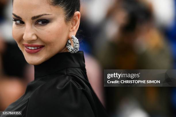 Canadian actress Sunny Leone poses during a photocall for the film "Kennedy" at the 76th edition of the Cannes Film Festival in Cannes, southern...