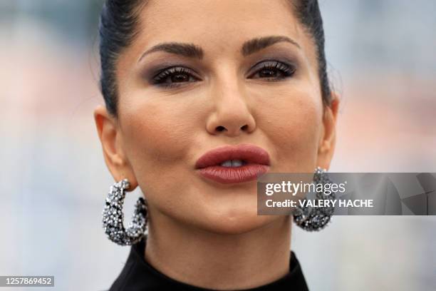 Canadian actress Sunny Leone poses during a photocall for the film "Kennedy" at the 76th edition of the Cannes Film Festival in Cannes, southern...