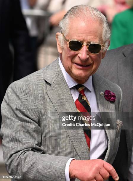 King Charles III waves to members of the public at Market House Theatre square on May 25, 2023 in Armagh, Northern Ireland. King Charles III and...