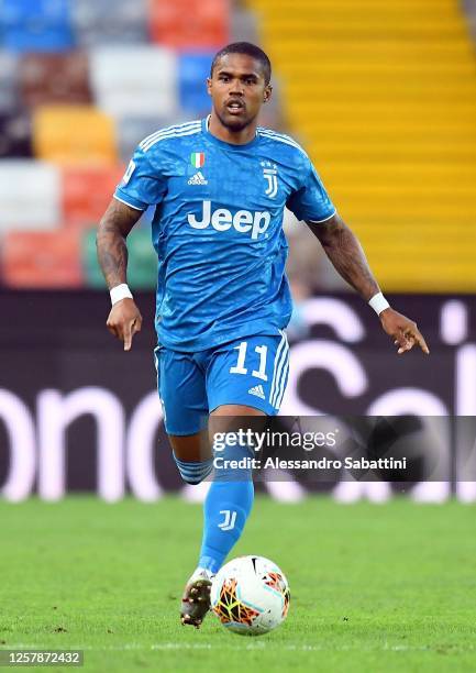 Douglas Costa of Juventus in action during the Serie A match between Udinese Calcio and Juventus at Stadio Friuli on July 23, 2020 in Udine, Italy.