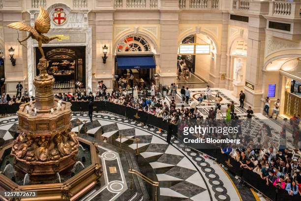 Visitors wait for the celebrities during the opening at the Londoner Macao casino resort, operated by Sands China Ltd., a unit of Las Vegas Sands...