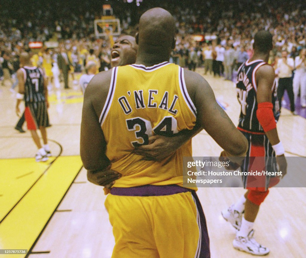 Glen Rice Houston Rockets Glenn Rice hugs Shaq after the buzzer of the Rockets 101-100 loss to ...