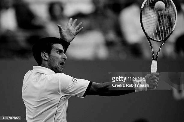 Novak Djokovic of Serbia returns a ball against Rafael Nadal of Spain during the Men's Final on Day Fifteen of the 2011 US Open at the USTA Billie...