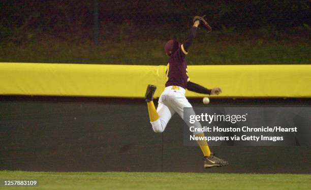 Bellaire centerfielder Hunter Johnson can't get to a double by Jeremy Dunham in the 2nd inning vs. Vancouver, WA at Howard J. Lamade Stadium Monday...