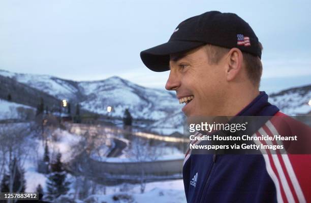 Todd Hays laughs against a backdrop of the sliding track during an interview following races at the Verizon Championship Series at Utah Olympic Park,...