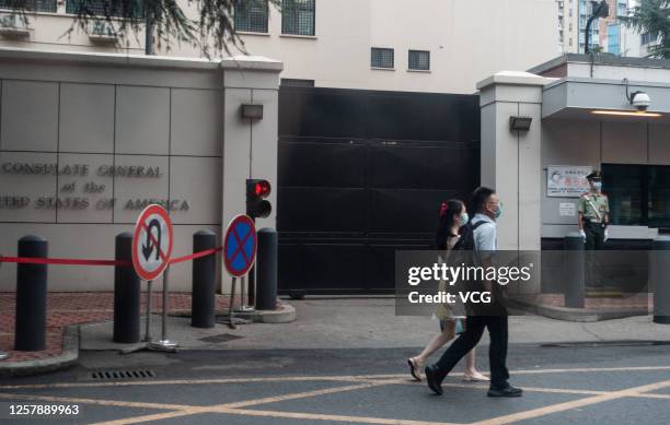 People walk by the US Consulate-General in Chengdu on July 23, 2020 in Chengdu, Sichuan Province of China.