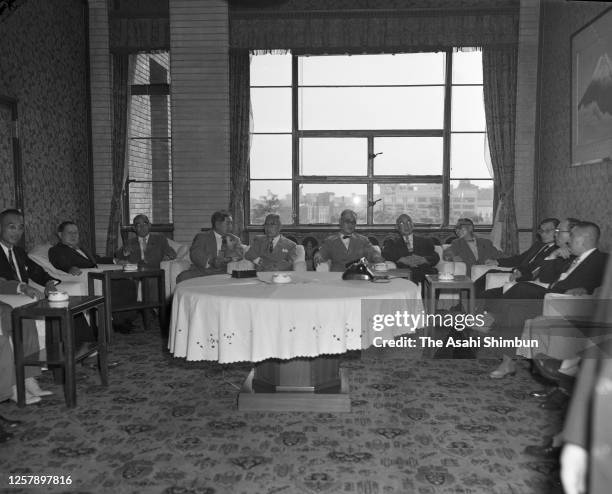 Foreign Minister Mamoru Shigemitsu and reports on his visit to the Soviet Union to Prime Minister Ichiro Hatoyama and cabinet members on September 3,...