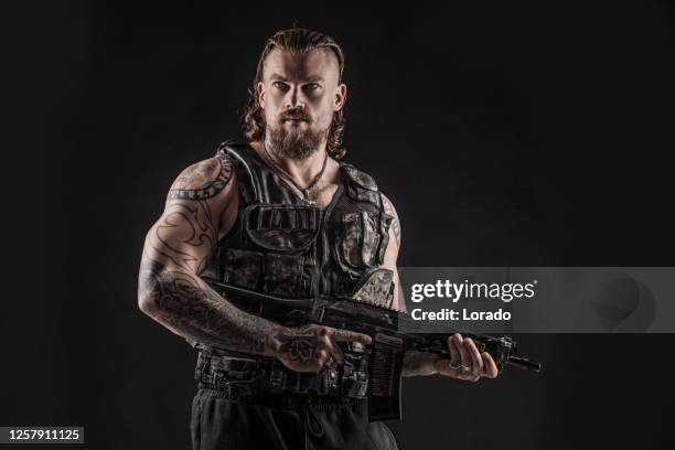 modern urban warfare military soldier in studio shoot - handsome hunks stock pictures, royalty-free photos & images