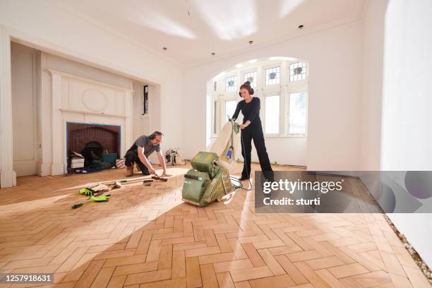 parquet floor sanding - sander stock pictures, royalty-free photos & images