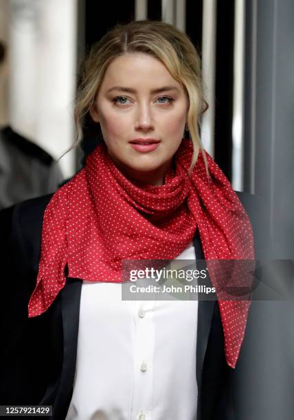 Amber Heard arrives at the Royal Courts of Justice, the Strand on July 24, 2020 in London, England. Hollywood actor Johnny Depp is suing News Group...