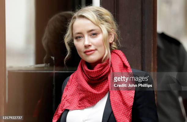 Amber Heard arrives at the Royal Courts of Justice, the Strand on July 24, 2020 in London, England. Hollywood actor Johnny Depp is suing News Group...