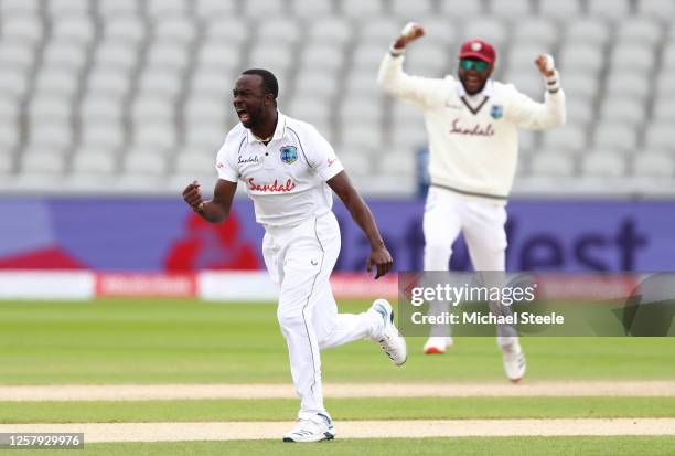 Kemar Roach of West Indies celebrates after taking the wicket of Dominic Sibley of England during Day One of the Ruth Strauss Foundation Test, the...