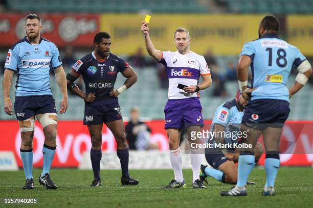 Referee Angus Gardner shows Joe Cotton of the Waratahs a yellow card during the round 4 Super Rugby AU match between the NSW Waratahs and the...