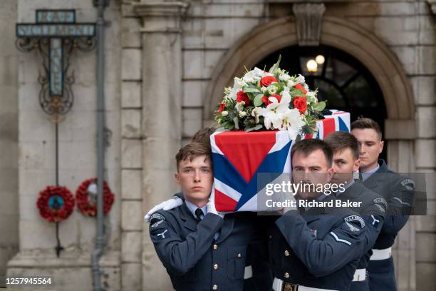 Pallbearers carry the coffin of Flt Sgt Peter Brown, a Jamaican-born WW2 RAF airman after his funeral service at the Royal Air Force's historic St...