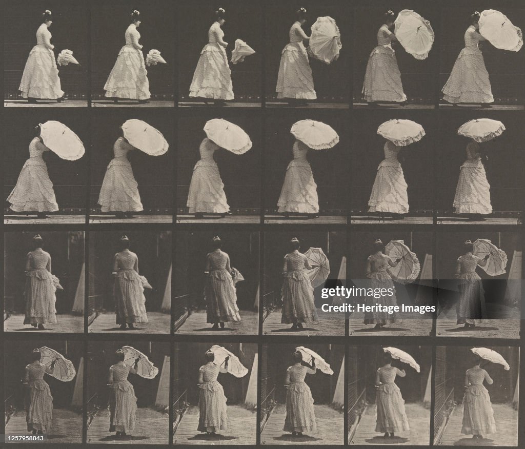 Woman Opening Parasol