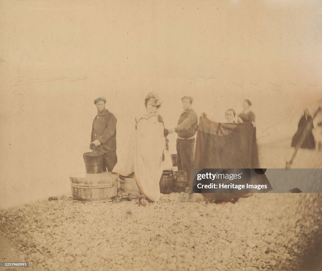 La Comtesse With Group On A Rocky Beach