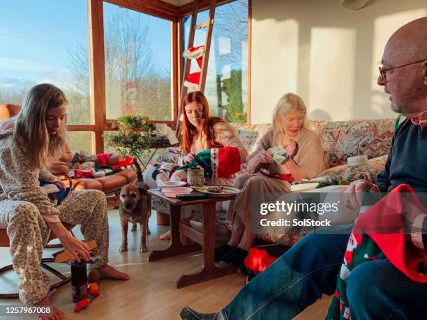 christmas morning traditions - 12 17 months stock pictures, royalty-free photos & images