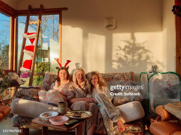 multi-generation family on christmas day - 12 17 months stock pictures, royalty-free photos & images