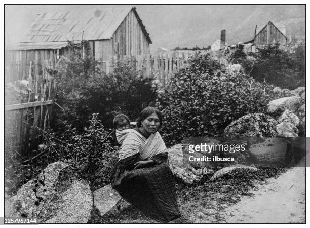 antique black and white photo: native woman in yale, on the fraser river, british columbia - minority groups stock illustrations