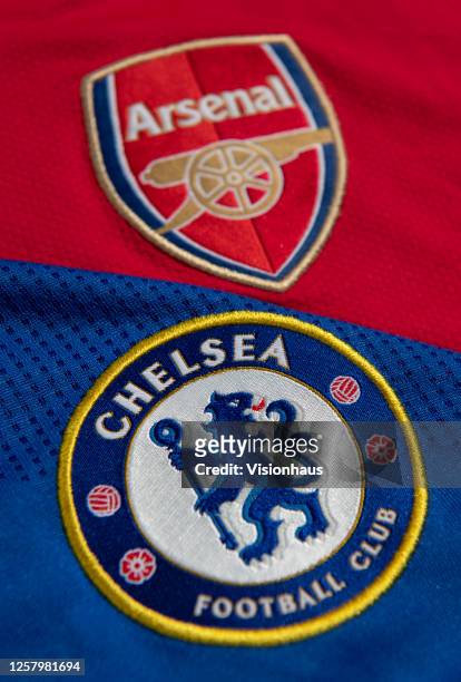 The Arsenal and Chelsea club crests on the first team home shirts on July 24, 2020 in Manchester, United Kingdom.