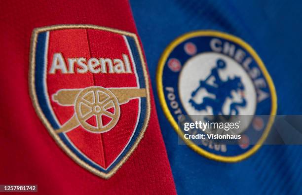 The Arsenal and Chelsea club crests on the first team home shirts on July 24, 2020 in Manchester, United Kingdom.