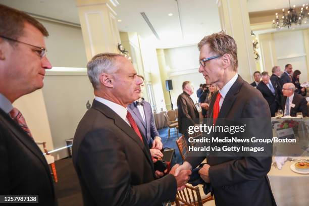 March 6, 2019: Commissioner of Baseball Robert D. Manfred Jr. Center, greets Boston Red Sox Owner John Henry during the Boston College Chief...