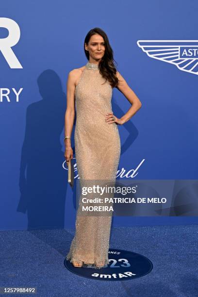 Estonian model Carmen Kass arrives to attend the annual amfAR Cinema Against AIDS Cannes Gala at the Hotel du Cap-Eden-Roc in Cap d'Antibes, southern...