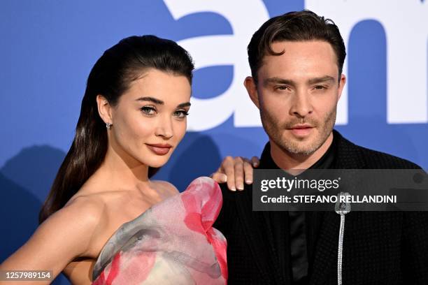 British actress Amy Jackson and British actor Ed Westwick arrive to attend the annual amfAR Cinema Against AIDS Cannes Gala at the Hotel du...