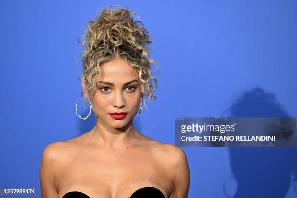 Belgian model Rose Bertram arrives to attend the annual amfAR Cinema Against AIDS Cannes Gala at the Hotel du Cap-Eden-Roc in Cap d'Antibes, southern...