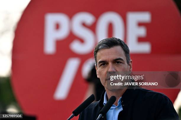 Spain's Prime Minister Pedro Sanchez speaks during an electoral meeting of Spain's Socialist Party leaders in Madrid on May 25, 2023 ahead of the May...