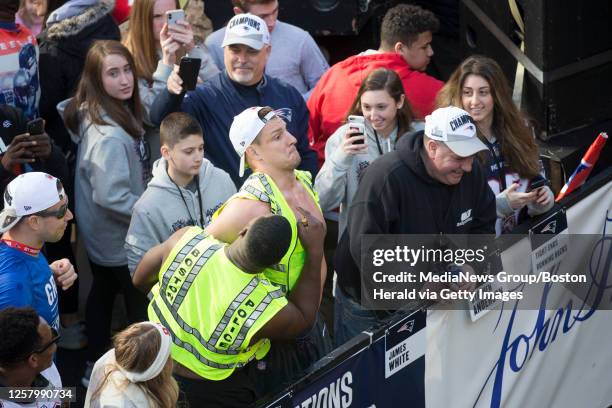 February 4, 2019: New England Patriot Rob Gronkowski pretends to be arrested during the New England Patriots Super Bowl LIII rolling rally victory...