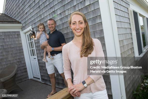 August 1, 2019: Stroke survivor Katie Buteau with her husband Joe and young daughter Nell in Chatham, Massachusetts.