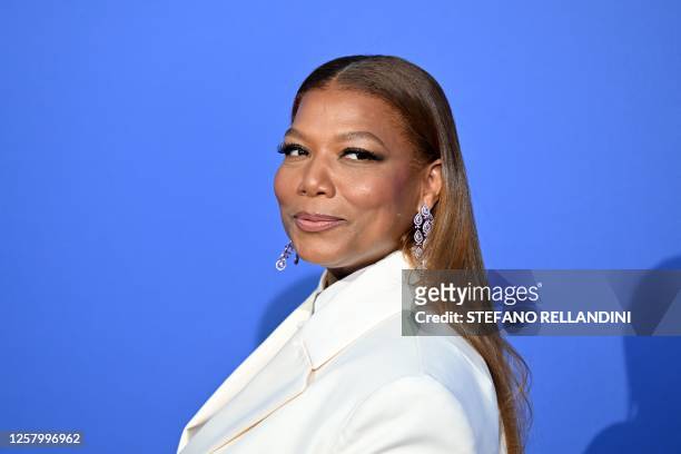 Rapper Queen Latifah arrives to attend the annual amfAR Cinema Against AIDS Cannes Gala at the Hotel du Cap-Eden-Roc in Cap d'Antibes, southern...