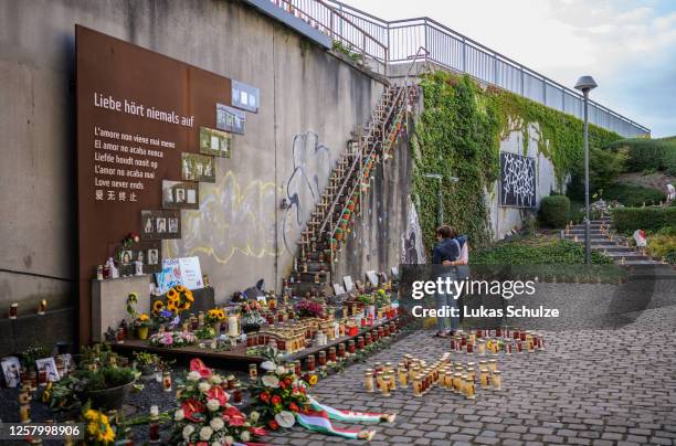 People arrive to commemorate the 10th anniversary of the Love Parade disaster at the disaster site on July 24, 2020 in Duisburg, Germany. Twenty-one...