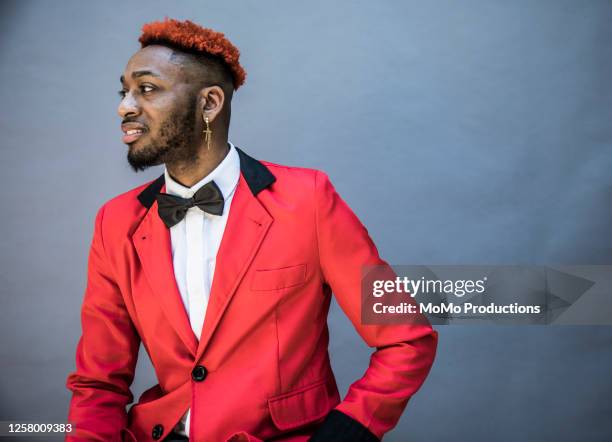 studio portrait of man in dinner coat - dyed hair stock pictures, royalty-free photos & images