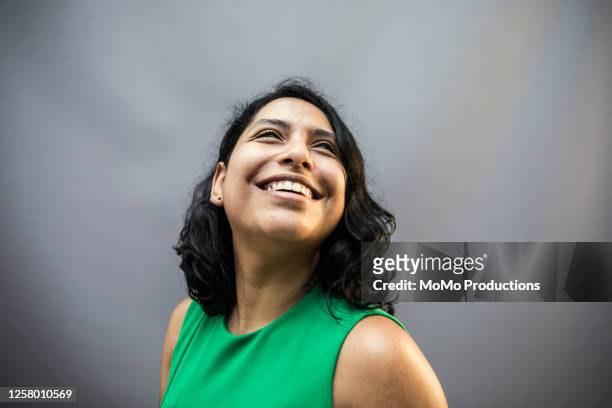 studio portrait of businesswoman - looking up stock pictures, royalty-free photos & images