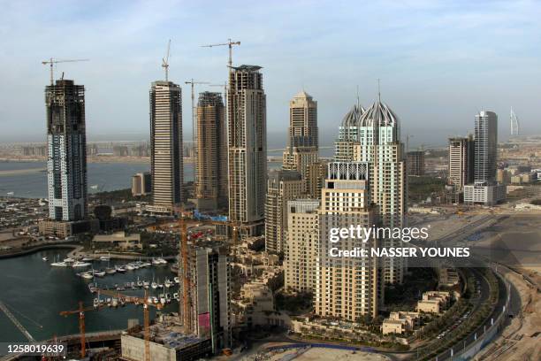 An aerial view taken 29 January 2006 shows Marsa Dubai or Dubai Marina in the Gulf Emirate of Dubai. The marina is the first big project of the...