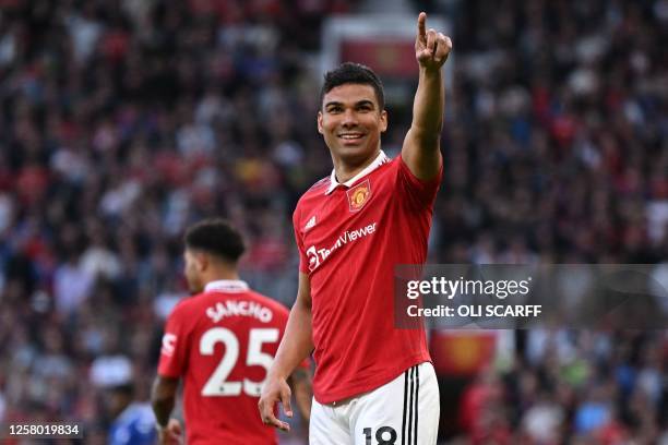 Manchester United's Brazilian midfielder Casemiro celebrates after scoring their opening goal during the English Premier League football match...