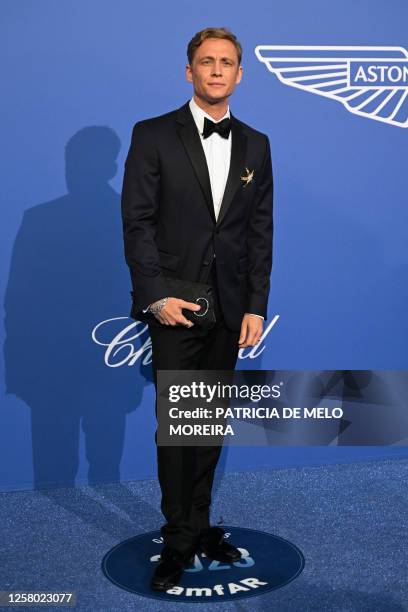 German actor Matthias Schweighofer arrives to attend the annual amfAR Cinema Against AIDS Cannes Gala at the Hotel du Cap-Eden-Roc in Cap d'Antibes,...