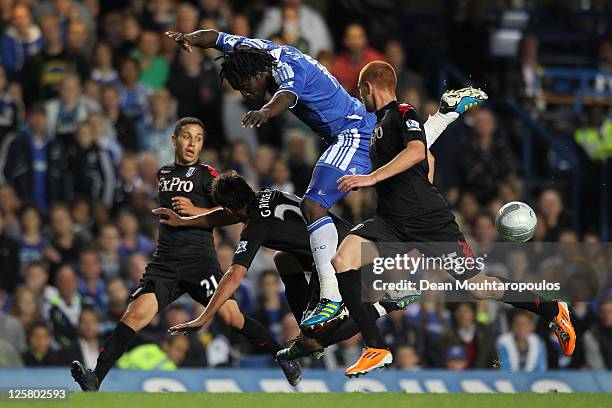 Romelu Lukaku of Chelsea tries to force his way through the Fulham defence of Kerim Frei, Zdenek Grygera and Marcel Gecov during the Carling Cup...