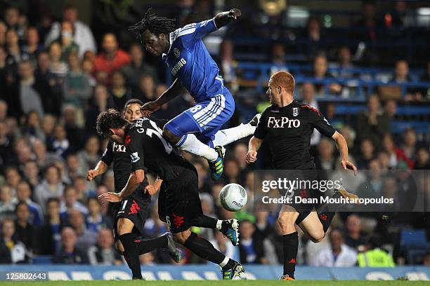 Romelu Lukaku of Chelsea tries to force his way through the Fulham defence of Kerim Frei, Zdenek Grygera and Marcel Gecov during the Carling Cup...