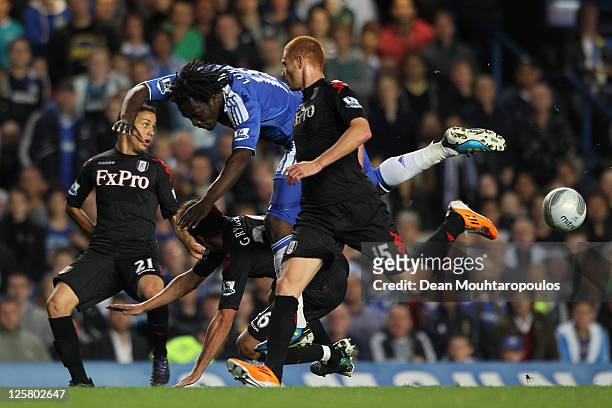 Romelu Lukaku of Chelsea tries to force his way through the Fulham defence of Kerim Frei, Zdenek Grygera and Marcel Gecov during the Carling Cup...